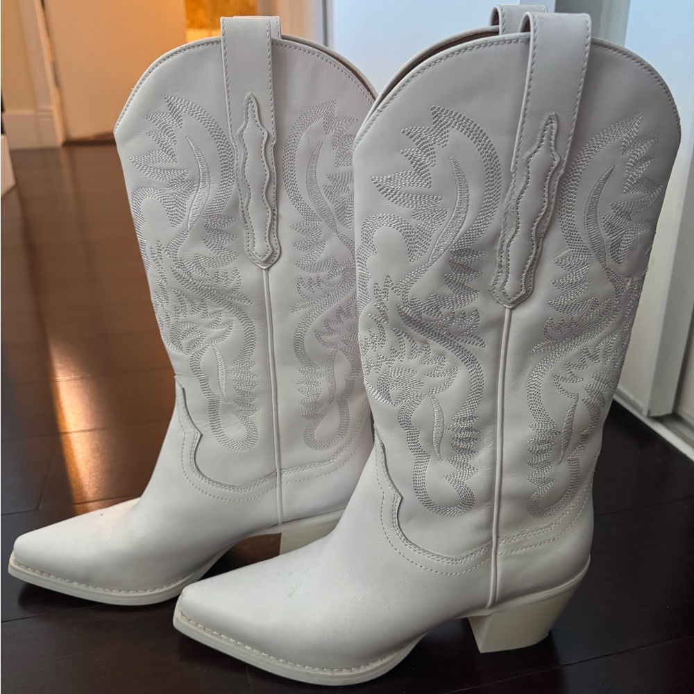 Jeffrey Campbell White Heeled Boots with Western Flair
Never worn outside house